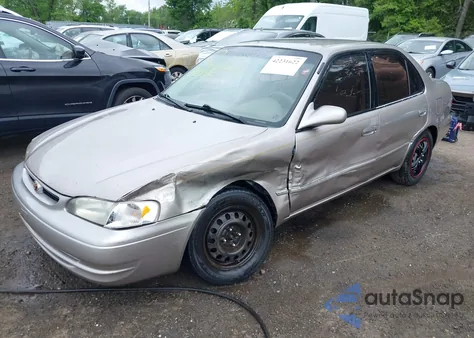 1999 Toyota Corolla Le из США, поврежденный, VIN 2T1BR12E9XC204275